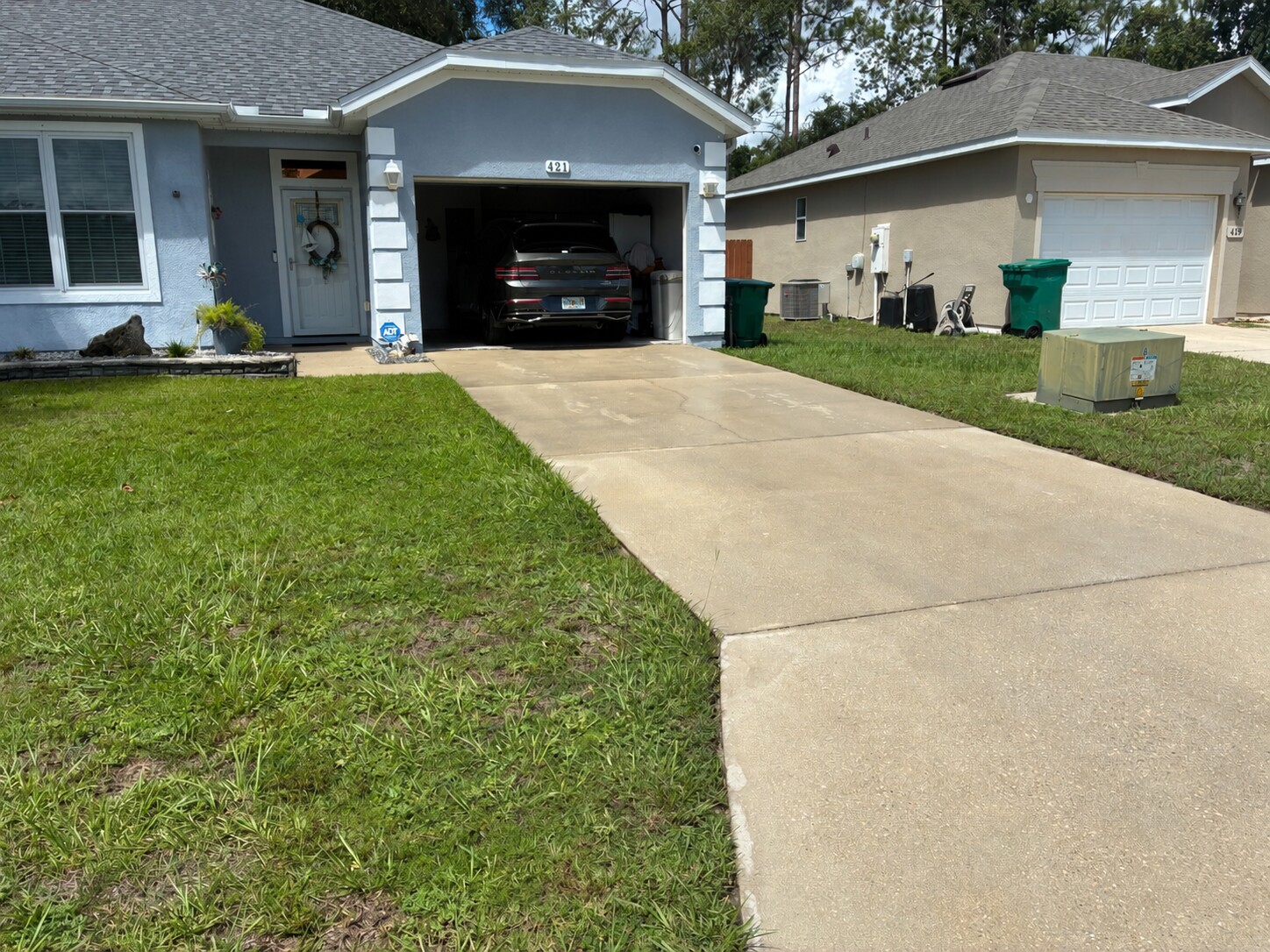 Driveway after pressure washing by Highwater Exterior Cleaning in Lady Lake Florida