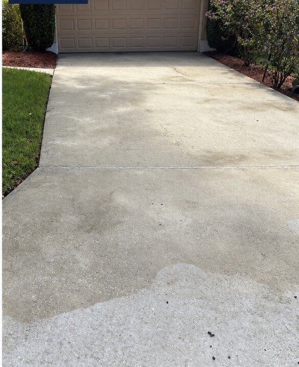 Residential driveway after pressure washing in Longwood, Florida